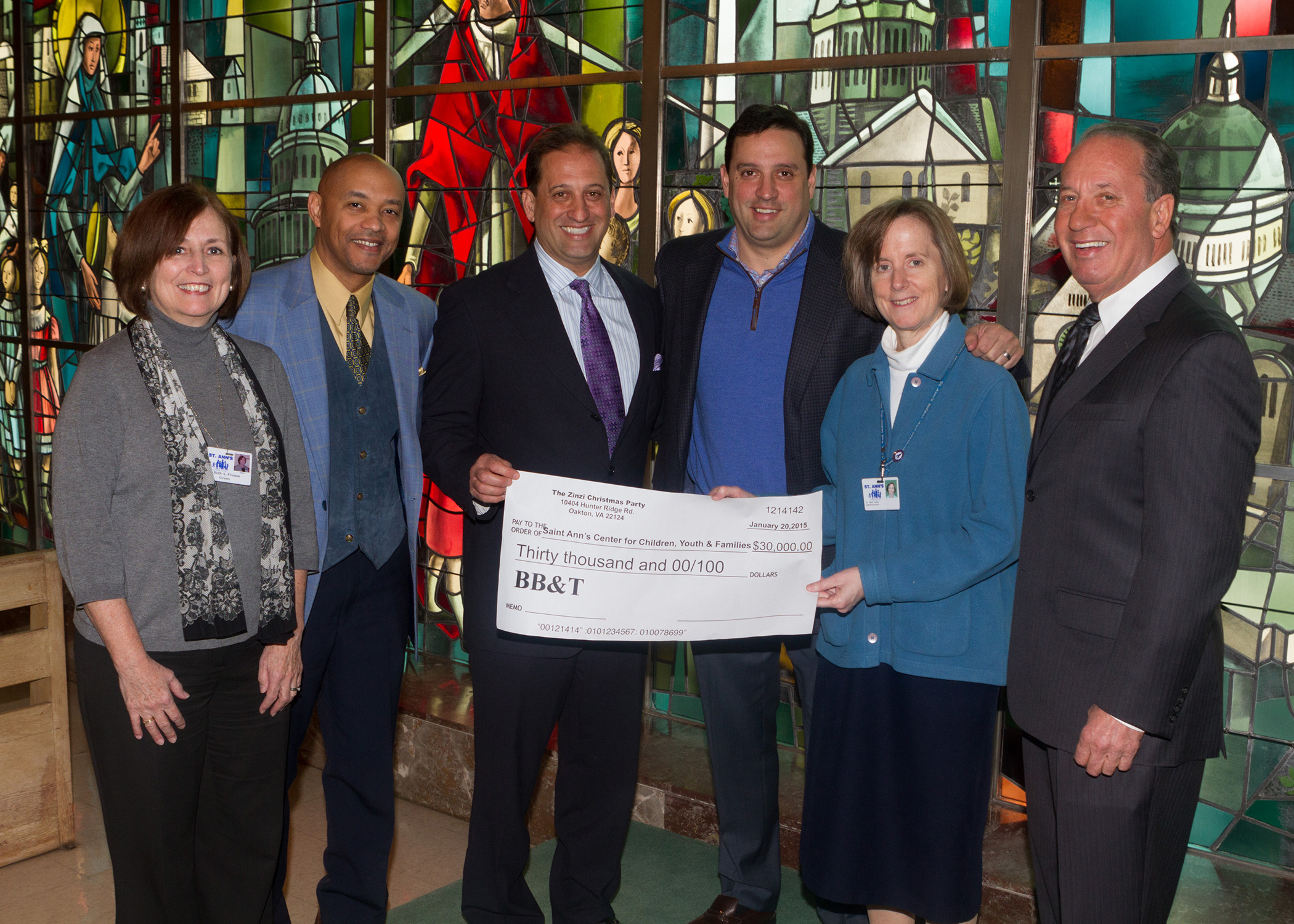 Zinzi Christmas Party Raises 30,000 to Support St. Ann's Mission St